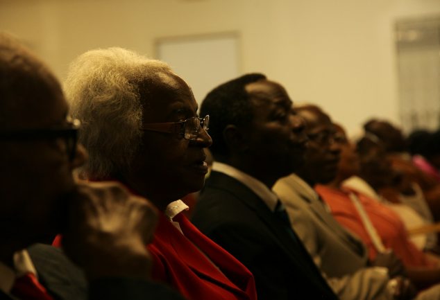 Group of older Black people in church