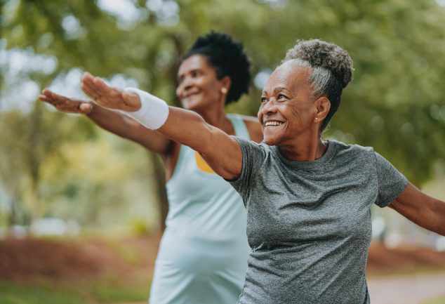 Elderly women exercising in park